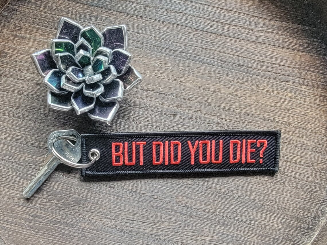 But Did You Die Keychain